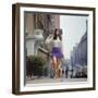 Long Hair Woman with short skirt, lace top and sandals walking up street in "New York Look" fashion-Vernon Merritt III-Framed Photographic Print