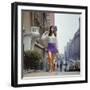 Long Hair Woman with short skirt, lace top and sandals walking up street in "New York Look" fashion-Vernon Merritt III-Framed Photographic Print