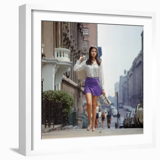 Long Hair Woman with short skirt, lace top and sandals walking up street in "New York Look" fashion-Vernon Merritt III-Framed Photographic Print