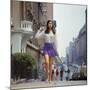 Long Hair Woman with short skirt, lace top and sandals walking up street in "New York Look" fashion-Vernon Merritt III-Mounted Photographic Print