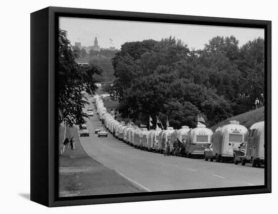 Long Line of Airstream Trailers Wait for Parking Space at a Campground During a Trailer Rally-Ralph Crane-Framed Stretched Canvas