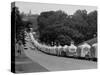 Long Line of Airstream Trailers Wait for Parking Space at a Campground During a Trailer Rally-Ralph Crane-Stretched Canvas