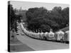 Long Line of Airstream Trailers Wait for Parking Space at a Campground During a Trailer Rally-Ralph Crane-Stretched Canvas