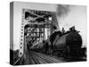 Long String of Tank Cars Rumbling Across the 4 1/2 Mile Huey Long Bridge at New Orleans-Peter Stackpole-Stretched Canvas