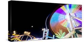 Long Time Exposure at Night at the Oktoberfest, Fairground Rides-Benjamin Engler-Stretched Canvas