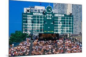 Long view of scoreboard and full bleachers during a professional baseball game, Wrigley Field, I...-null-Mounted Premium Photographic Print