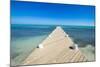 Long wooden pier in the turquoise waters of Providenciales, Turks and Caicos, Caribbean-Michael Runkel-Mounted Photographic Print
