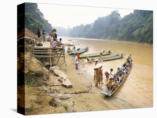 Longboat Crowded with Children Leaving for Week at School, Katibas River, Island of Borneo-Richard Ashworth-Stretched Canvas