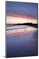 Looking across Embleton Bay at Sunrise Towards the Silhouetted Ruins of Dunstanburgh Castle-Lee Frost-Mounted Photographic Print