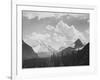 Looking Across Forest To Mountains And Clouds "In Glacier National Park" Montana. 1933-1942-Ansel Adams-Framed Art Print