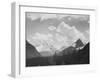 Looking Across Forest To Mountains And Clouds "In Glacier National Park" Montana. 1933-1942-Ansel Adams-Framed Art Print