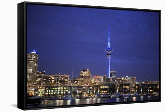 Looking across Waitemata Harbor and Sky Tower from Wynyard Quarter of Auckland, New Zealand-Paul Dymond-Framed Stretched Canvas