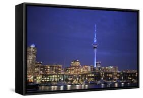 Looking across Waitemata Harbor and Sky Tower from Wynyard Quarter of Auckland, New Zealand-Paul Dymond-Framed Stretched Canvas