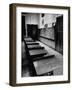 Looking Down Row of Empty Scarred Old Fashioned Desks in Schoolroom-Walter Sanders-Framed Photographic Print