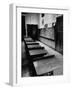 Looking Down Row of Empty Scarred Old Fashioned Desks in Schoolroom-Walter Sanders-Framed Photographic Print