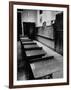 Looking Down Row of Empty Scarred Old Fashioned Desks in Schoolroom-Walter Sanders-Framed Photographic Print