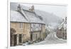 Looking down the quintessential English village of Castle Combe in the snow, Wiltshire, England, Un-Paul Porter-Framed Photographic Print