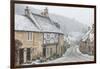 Looking down the quintessential English village of Castle Combe in the snow, Wiltshire, England, Un-Paul Porter-Framed Photographic Print