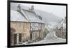 Looking down the quintessential English village of Castle Combe in the snow, Wiltshire, England, Un-Paul Porter-Framed Photographic Print