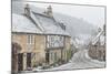 Looking down the quintessential English village of Castle Combe in the snow, Wiltshire, England, Un-Paul Porter-Mounted Photographic Print