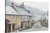 Looking down the quintessential English village of Castle Combe in the snow, Wiltshire, England, Un-Paul Porter-Stretched Canvas