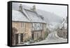 Looking down the quintessential English village of Castle Combe in the snow, Wiltshire, England, Un-Paul Porter-Framed Stretched Canvas