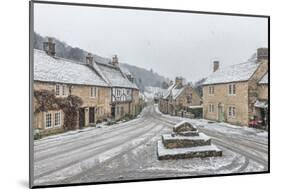 Looking down the quintessential English village of Castle Combe in the snow, Wiltshire, England, Un-Paul Porter-Mounted Photographic Print