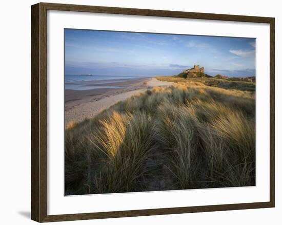 Looking Towards Bamburgh Castle Bathed in Evening Light from the Dunes Above Bamburgh Beach-Lee Frost-Framed Photographic Print