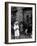 Lorenza Curiel in White First Communion Dress Waiting for Mother to Lock Door-W^ Eugene Smith-Framed Photographic Print