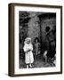 Lorenza Curiel in White First Communion Dress Waiting for Mother to Lock Door-W^ Eugene Smith-Framed Photographic Print