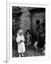 Lorenza Curiel in White First Communion Dress Waiting for Mother to Lock Door-W^ Eugene Smith-Framed Photographic Print