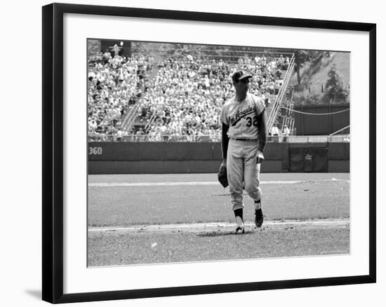 Los Angeles Dodgers Pitcher Sandy Koufax Taking the Field During Game Against the Milwaukee Braves-Robert W^ Kelley-Framed Premium Photographic Print