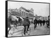 Los Angeles Police Officers Bicycling Past Broadway Storefronts-null-Framed Stretched Canvas