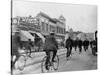 Los Angeles Police Officers Bicycling Past Broadway Storefronts-null-Stretched Canvas