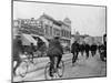 Los Angeles Police Officers Bicycling Past Broadway Storefronts-null-Mounted Photographic Print
