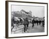 Los Angeles Police Officers Bicycling Past Broadway Storefronts-null-Framed Photographic Print