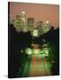 Los Angeles Skyline and Freeway, Illuminated at Night, California, USA-Howell Michael-Stretched Canvas