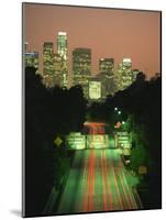 Los Angeles Skyline and Freeway, Illuminated at Night, California, USA-Howell Michael-Mounted Photographic Print