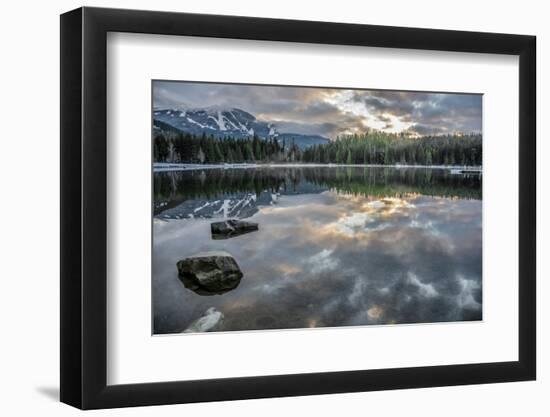 Lost Lake, so still it gives a perfect reflection of the sunset, ski hill and surrounding forest, W-Paul Porter-Framed Photographic Print