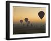 Lots of Hot Air Balloons Flying over the Desert at Sunrise West of the River Nile Near Luxor, Egypt-Neale Clark-Framed Photographic Print