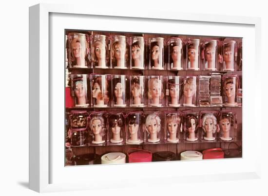 Lots of Wigs on Mannequins' Heads-null-Framed Art Print