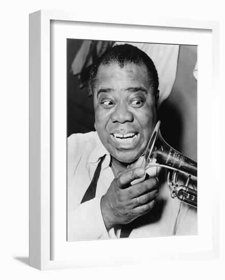 Louis Armstrong, African American Jazz Musician, with His Trademark Smile and Trumpet, 1953-null-Framed Photo