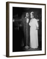 Louis Armstrong and Vocalist Performing in Floor Show at Cafe Zanzibar-Alfred Eisenstaedt-Framed Premium Photographic Print