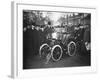 Louis Renault in the Driver's Seat of a Voiturette Renault 1¾ Hp, 1899-null-Framed Photographic Print