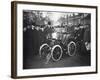 Louis Renault in the Driver's Seat of a Voiturette Renault 1¾ Hp, 1899-null-Framed Photographic Print