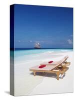 Lounge Chairs on Beach and Yacht, Maldives, Indian Ocean, Asia-Sakis Papadopoulos-Stretched Canvas