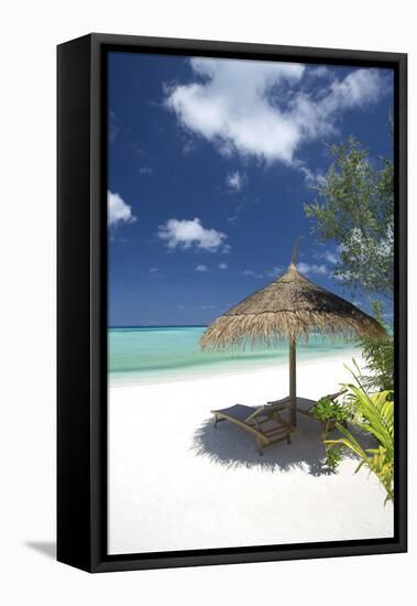 Lounge Chairs under Shade of Umbrella on Tropical Beach, Maldives, Indian Ocean, Asia-Sakis Papadopoulos-Framed Stretched Canvas