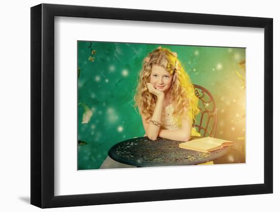 Lovely Girl in a Lush White Dress Reading Fairy Tales under a Floral Arch over Green Background.-prometeus-Framed Photographic Print