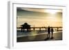 Loving Couple walking along the Beach at Sunset-Philippe Hugonnard-Framed Photographic Print