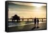 Loving Couple walking along the Beach at Sunset-Philippe Hugonnard-Framed Stretched Canvas